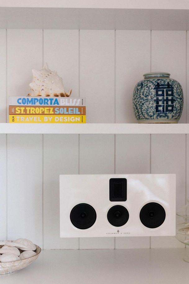 Steinway & Sons Speaker on a white paneled wood wall